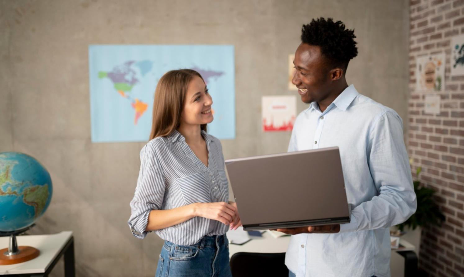 Diverse group working on financial planning calendars